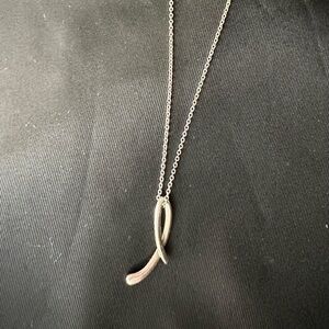Tiffany & Co. Silver Peretti cursive “L” necklace (sterling silver)